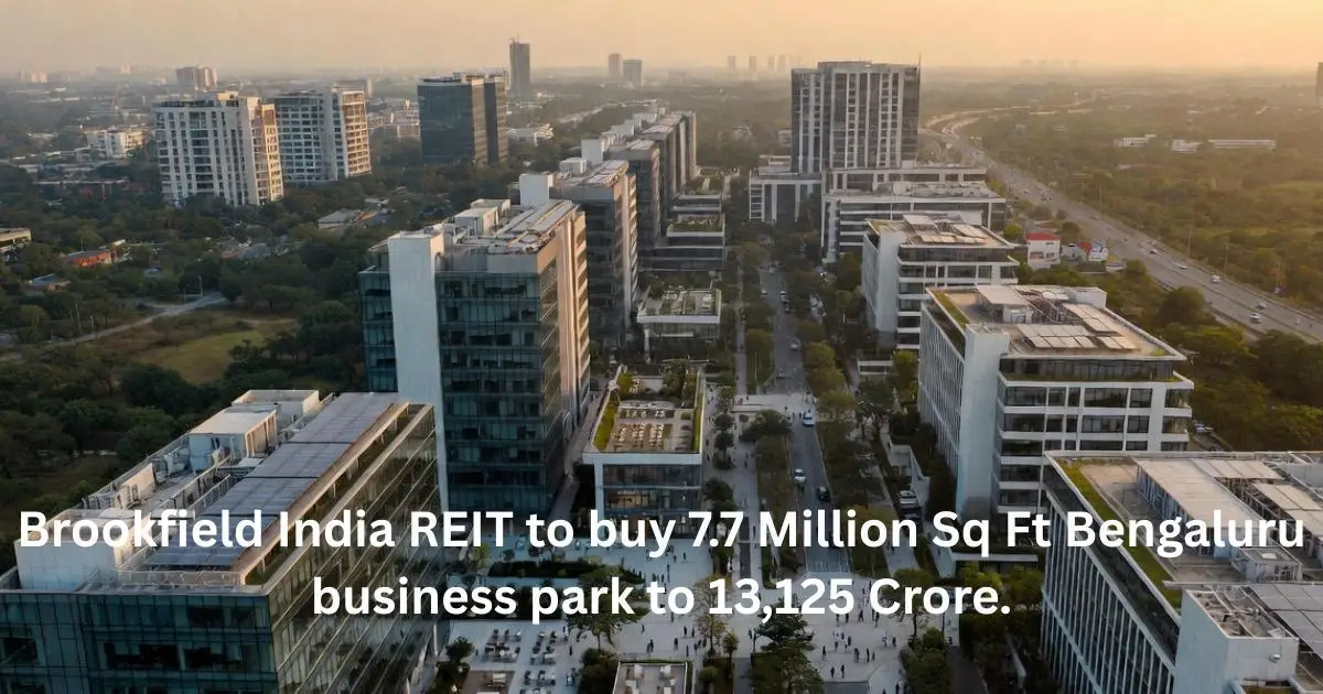 : Aerial view of a modern business park in Bengaluru, representing Brookfield India REIT's 7.7 million sq ft office acquisition.
