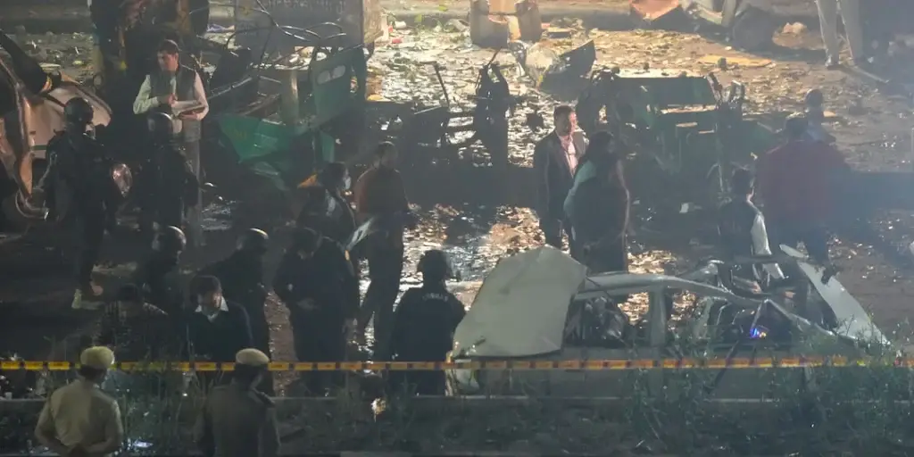 Scene near Delhi’s Red Fort after a powerful car explosion that killed nine and injured over twenty, as police investigate possible terror links.